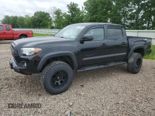 2020 Toyota Tacoma SR5 with VIN 5TFCZ5AN9LX213115, listed as a Copart auction lot 61819015 with 56,391 mi miles and Salvage title. Bid and sale history available at DreamBid. Image 1.