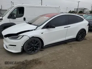 2023 Tesla Model X z VIN 7SAXCBE53PF380665, wystawiony jako Copart lot #59785495 z przebiegiem Nie podano mil oraz Szkoda całkowita • Salvage title. Historia ofert i sprzedaży dostępna na DreamBid. Obrazek 1.