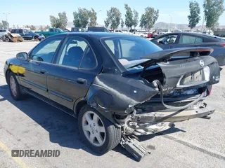 2005 Nissan Sentra S z VIN 3N1CB51D15L559284, wystawiony jako IAAI lot #42273159 z przebiegiem 217 646 mil mil oraz . Historia ofert i sprzedaży dostępna na DreamBid. Obrazek 3.