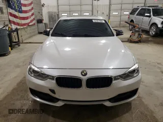 2013 BMW 3 Series 335i with VIN WBA3A9G51DNP36712, listed as a Copart auction lot 52407465 with 117,972 mi miles and Salvage title. Bid and sale history available at DreamBid. Image 5.
