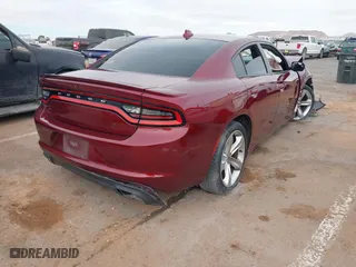 2018 Dodge Charger R/T with VIN 2C3CDXCT2JH313262, listed as a IAAI auction lot 41631641 with 57,238 mi miles. Bid and sale history available at carsss.com. Image 4.