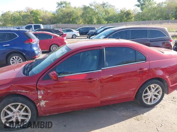 2010 Ford Fusion SE z VIN 3FAHP0HA9AR256835, wystawiony jako IAAI lot #42228249 z przebiegiem 200 519 mil mil oraz . Historia ofert i sprzedaży dostępna na DreamBid. Obrazek 14.