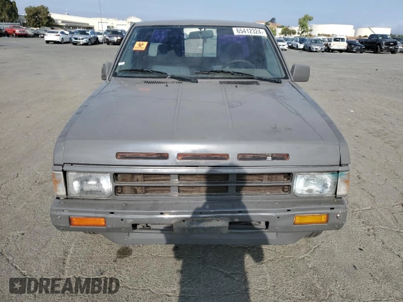 1989 Nissan Hardbody с VIN 1N6ND16S2KC377484, выставлен на аукционе Copart как лот 65412324 с пробегом 31 573 миль миль и Списание • Salvage title. История ставок и продаж доступна на DreamBid. Изображение 5.