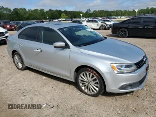 2012 Volkswagen Jetta SEL with VIN 3VWLP7AJ7CM300738, listed as a Copart auction lot 47934894 with 137,877 mi miles and Salvage title. Bid and sale history available at DreamBid. Image 4.
