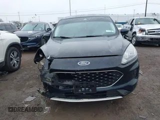 2021 Ford Escape SE z VIN 1FMCU9G63MUB17887, wystawiony jako IAAI lot #42005945 z przebiegiem 63 610 mil mil oraz . Historia ofert i sprzedaży dostępna na DreamBid. Obrazek 12.