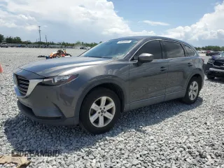 2018 Mazda CX-9 Touring z VIN JM3TCACY7J0232017, wystawiony jako Copart lot #54935485 z przebiegiem 99 350 mil mil oraz Szkoda całkowita • Salvage title. Historia ofert i sprzedaży dostępna na DreamBid. Obrazek 1.