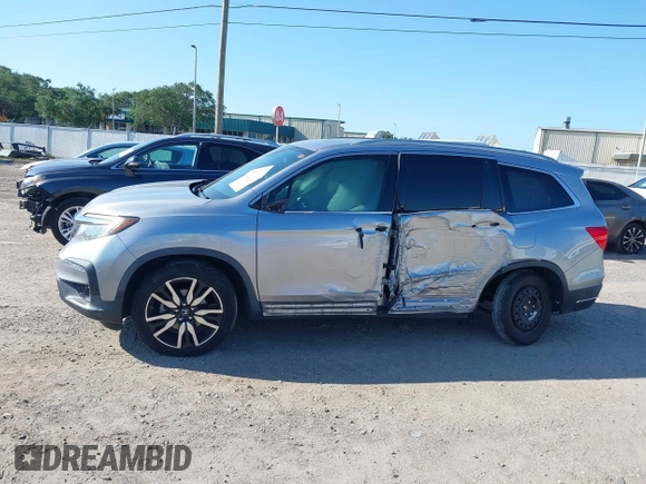 2019 Honda Pilot Elite with VIN 5FNYF6H00KB001016, listed as a IAAI auction lot 42583325 with 133,327 mi miles and . Bid and sale history available at DreamBid. Image 14.