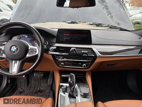 2018 BMW 5 Series M550i xDrive with VIN WBAJB9C57JB035521, listed as a Copart auction lot 54177125 with 63,924 mi miles and Clean Title. Bid and sale history available at carsss.com. Image 9.