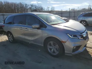 2020 Honda Odyssey EX-L with VIN 5FNRL6H73LB056720, listed as a Copart auction lot 87205024 with 60,219 mi miles and Salvage Title. Bid and sale history available at carsss.com. Image 4.