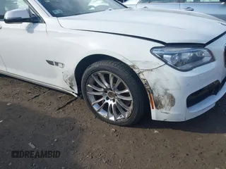 2015 BMW 7 Series 750Li xDrive with VIN WBAYF8C56FD654765, listed as a IAAI auction lot 40734550 with 133,848 mi miles and . Bid and sale history available at carsss.com. Image 6.