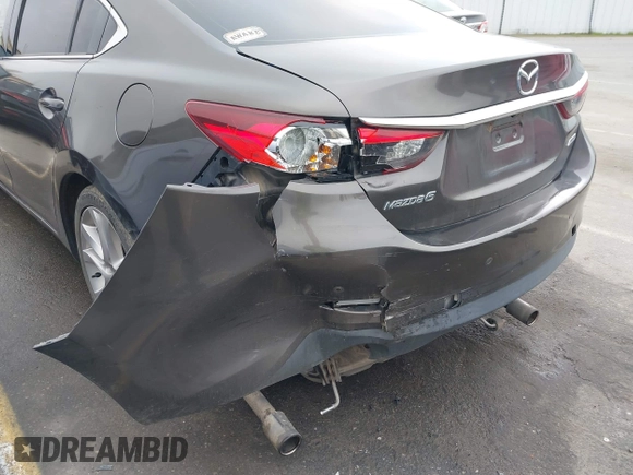 2016 Mazda 6 i Touring with VIN JM1GJ1V52G1473330, listed as a IAAI auction lot 41657684 with 138,064 mi miles and . Bid and sale history available at DreamBid. Image 17.