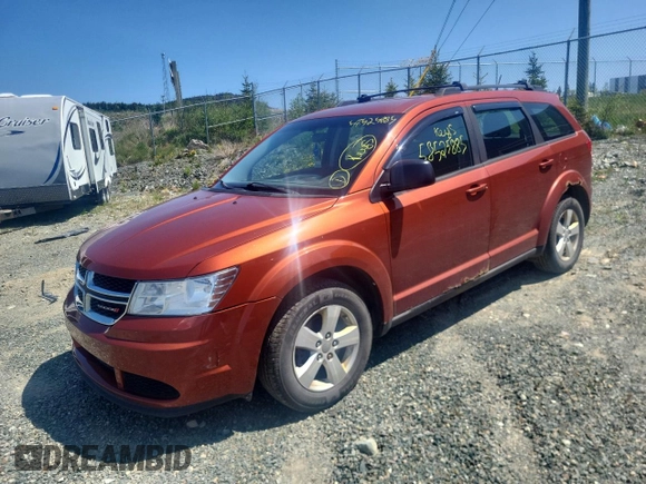 2013 Dodge Journey American Value z VIN 3C4PDCAB1DT656317, wystawiony jako Copart lot #58525885 z przebiegiem 210 834 mil mil oraz Szkoda całkowita • Salvage title. Historia ofert i sprzedaży dostępna na DreamBid. Obrazek 1.