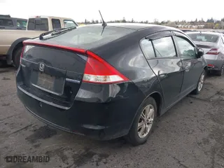 2010 Honda Insight EX with VIN JHMZE2H7XAS040192, listed as a IAAI auction lot 41926116 with 384,045 mi miles. Bid and sale history available at carsss.com. Image 4.