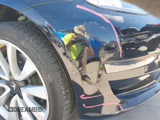2020 Tesla Model 3 Standard Range Plus with VIN 5YJ3E1EAXLF614002, listed as a IAAI auction lot 41758898 with 42,363 mi miles and . Bid and sale history available at DreamBid. Image 6.