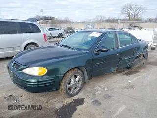2002 Pontiac Grand Am SE1 with VIN 1G2NF52FX2C165546, listed as a IAAI auction lot 41290065 with 149,834 mi miles. Bid and sale history available at carsss.com. Image 2.