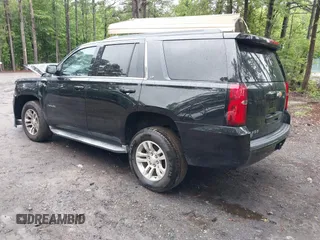 2015 Chevrolet Tahoe LT with VIN 1GNSCBKC9FR600997, listed as a IAAI auction lot 42383789 with 161,151 mi miles and . Bid and sale history available at DreamBid. Image 3.