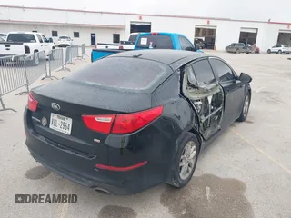 2014 Kia Optima LX z VIN 5XXGM4A79EG308084, wystawiony jako IAAI lot #41789552 z przebiegiem 267 803 mil mil oraz . Historia ofert i sprzedaży dostępna na DreamBid. Obrazek 4.