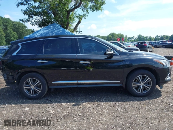 2019 Infiniti QX60 Luxe with VIN 5N1DL0MM0KC515759, listed as a IAAI auction lot 42743015 with 69,863 mi miles and . Bid and sale history available at DreamBid. Image 13.