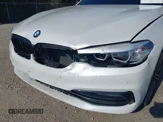 2018 BMW 5 Series 540i xDrive z VIN WBAJE7C59JG892017, wystawiony jako IAAI lot #42556936 z przebiegiem 55 170 mil mil oraz . Historia ofert i sprzedaży dostępna na DreamBid. Obrazek 6.