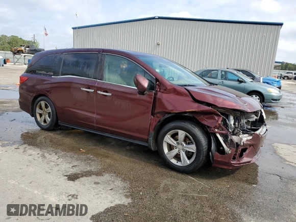 2018 Honda Odyssey EX-L z VIN 5FNRL6H75JB097041, wystawiony jako Copart lot #50617535 z przebiegiem 169 040 mil mil oraz Szkoda całkowita • Salvage title. Historia ofert i sprzedaży dostępna na DreamBid. Obrazek 4.