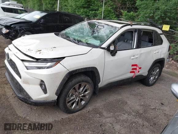2022 Toyota RAV4 XLE Premium z VIN 2T3A1RFV1NW312419, wystawiony jako IAAI lot #42361686 z przebiegiem 14 291 mil mil oraz . Historia ofert i sprzedaży dostępna na DreamBid. Obrazek 22.
