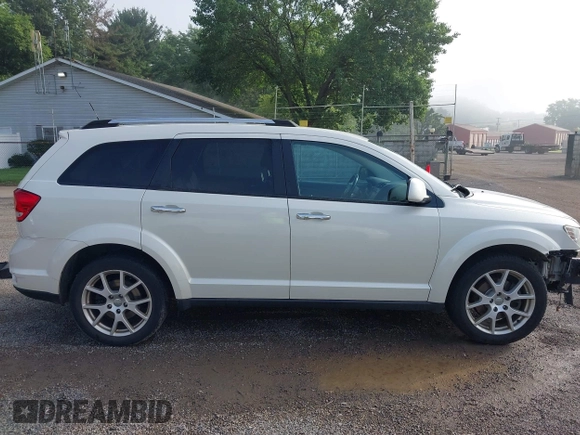 2013 Dodge Journey Crew with VIN 3C4PDCDG0DT591533, listed as a IAAI auction lot 42630548 with 164,961 mi miles and . Bid and sale history available at DreamBid. Image 13.