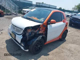 2016 Smart fortwo Passion with VIN WMEFJ5DA7GK079058, listed as a IAAI auction lot 42415044 with 42,279 mi miles and . Bid and sale history available at DreamBid. Image 2.