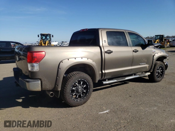 2012 Toyota Tundra 4WD Truck with VIN 5TFDW5F18CX256122, listed as a Copart auction lot 47142355 with 194,668 mi miles and Salvage Title. Bid and sale history available at carsss.com. Image 3.