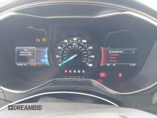 2016 Ford Fusion Titanium with VIN 3FA6P0K99GR235692, listed as a IAAI auction lot 42587743 with 169,467 mi miles and . Bid and sale history available at DreamBid. Image 7.