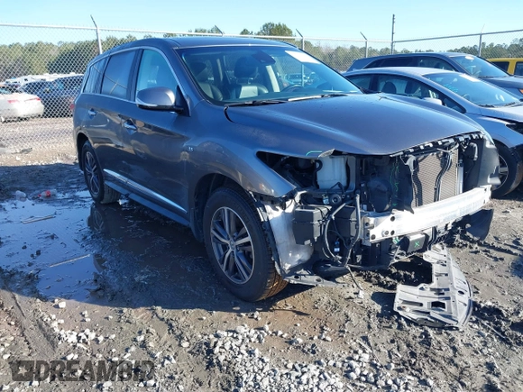 2019 Infiniti QX60 LUXE with VIN 5N1DL0MN7KC532048, listed as a IAAI auction lot 41206582 with 77,675 mi miles. Bid and sale history available at carsss.com. Image 1.