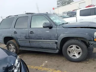 2004 Chevrolet Tahoe LT with VIN 1GNEC13Z24J330050, listed as a IAAI auction lot 41802659 with 278,497 mi miles. Bid and sale history available at carsss.com. Image 13.