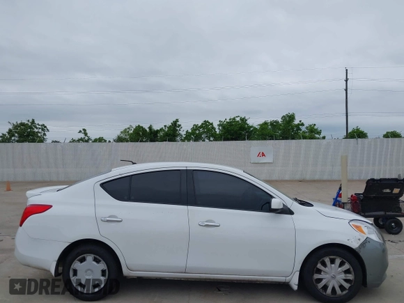 2014 Nissan Versa SV with VIN 3N1CN7AP9EL809772, listed as a IAAI auction lot 42199651 with 163,102 mi miles. Bid and sale history available at carsss.com. Image 5.