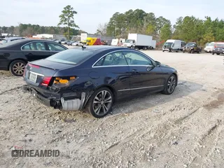 2015 Mercedes-Benz E-Class E 400 with VIN WDDKJ6FB4FF307393, listed as a IAAI auction lot 41775634 with 100,928 mi miles. Bid and sale history available at carsss.com. Image 4.