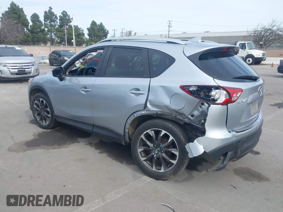 2016 Mazda CX-5 Grand Touring with VIN JM3KE2DY9G0723921, listed as a IAAI auction lot 41681522 with 83,893 mi miles. Bid and sale history available at carsss.com. Image 3.