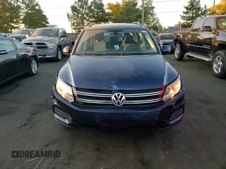 2016 Volkswagen Tiguan S with VIN WVGBV7AX7GW597875, listed as a Copart auction lot 74781864 with 74,175 mi miles and Salvage Title. Bid and sale history available at DreamBid. Image 11.