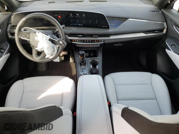 2024 Cadillac XT4 AWD Sport с VIN 1GYFZFR47RF125557, выставлен на аукционе Copart как лот 70869104 с пробегом 8 714 миль миль и Списание • Salvage title. История ставок и продаж доступна на DreamBid. Изображение 8.