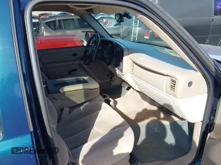 2005 Chevrolet Tahoe LT z VIN 1GNEC13T25R131448, wystawiony jako IAAI lot #41748373 z przebiegiem 270 659 mil mil oraz . Historia ofert i sprzedaży dostępna na DreamBid. Obrazek 5.