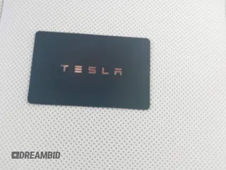 2025 Tesla Model 3 Long Range with VIN 5YJ3E1EA6SF967254, listed as a IAAI auction lot 42345651 with 1,180 mi miles and . Bid and sale history available at DreamBid. Image 11.