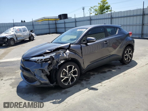 2021 Toyota C-HR LE with VIN JTNKHMBX1M1115317, listed as a Copart auction lot 56200305 with 82,237 mi miles and Clean Title. Bid and sale history available at DreamBid. Image 1.