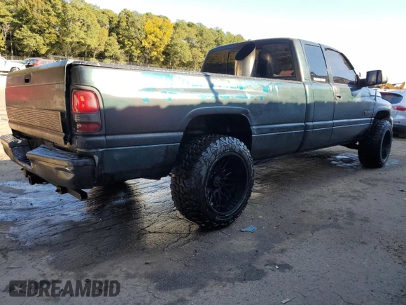 1999 Dodge Ram 2500 with VIN 1B7KC2368XJ548487, listed as a Copart auction lot 77256244 with 301,818 mi miles and Salvage Title. Bid and sale history available at carsss.com. Image 3.