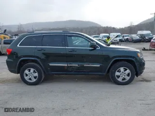 2011 Jeep Grand Cherokee Laredo with VIN 1J4RR4GG9BC546198, listed as a IAAI auction lot 41879387 with 190,973 mi miles. Bid and sale history available at carsss.com. Image 13.