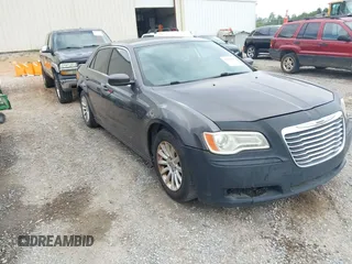 2013 Chrysler 300 with VIN 2C3CCAAG4DH588190, listed as a IAAI auction lot 42476895 with 224,837 mi miles and . Bid and sale history available at DreamBid. Image 1.