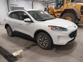 2021 Ford Escape Titanium Hybrid with VIN 1FMCU9DZXMUB03855, listed as a IAAI auction lot 41498132 with 63,892 mi miles and . Bid and sale history available at DreamBid. Image 1.