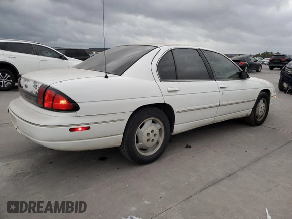 1997 Chevrolet Lumina LS with VIN 2G1WL52M5V9107095, listed as a Copart auction lot 73659954 with 135,669 mi miles and Salvage Title. Bid and sale history available at DreamBid. Image 3.