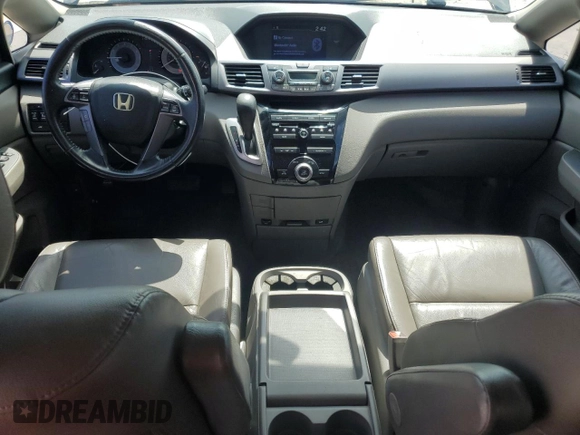 2012 Honda Odyssey EX-L with VIN 5FNRL5H65CB055196, listed as a Copart auction lot 50858245 with 115,047 mi miles and Salvage Title. Bid and sale history available at carsss.com. Image 8.