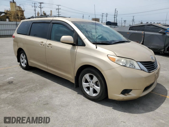 2012 Toyota Sienna LE AAS with VIN 5TDKK3DC5CS227808, listed as a Copart auction lot 57984515 with 103,656 mi miles and Salvage title. Bid and sale history available at DreamBid. Image 4.