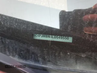 2020 Jeep Cherokee Trailhawk Elite z VIN 1C4PJMBN4LD549550, wystawiony jako Copart lot #64161064 z przebiegiem Nie podano mil oraz Szkoda całkowita • Salvage title. Historia ofert i sprzedaży dostępna na DreamBid. Obrazek 13.