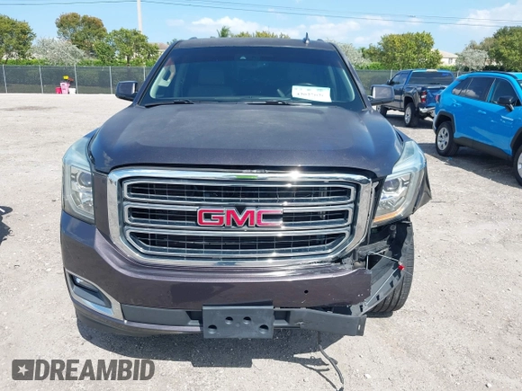 2016 GMC Yukon SLT with VIN 1GKS2BKC2GR277460, listed as a IAAI auction lot 42027026 with 111,191 mi miles. Bid and sale history available at carsss.com. Image 6.