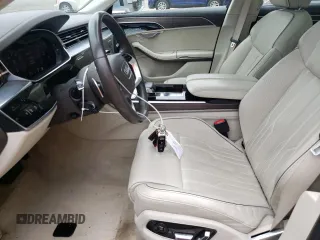 2019 Audi A8 с VIN WAU8DAF83KN010955, выставлен на аукционе Copart как лот 59734495 с пробегом 30 479 миль миль и Списание • Salvage title. История ставок и продаж доступна на DreamBid. Изображение 7.