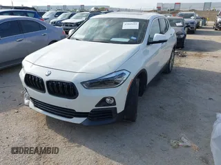 2020 BMW X2 sDrive28i with VIN WBXYH9C07L5P35810, listed as a IAAI auction lot 42043222 with 101,329 mi miles and . Bid and sale history available at DreamBid. Image 2.